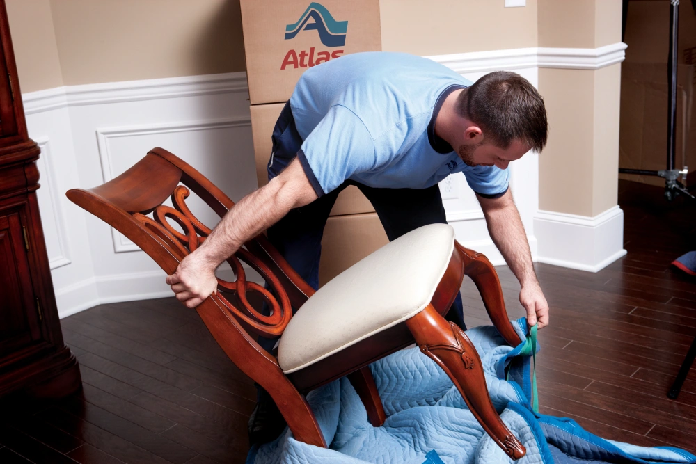Mover wrapping chair in padding